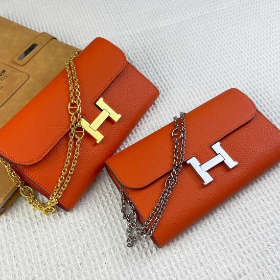 Hermes 539 Constance 橘色手掌紋鍊條單肩包  